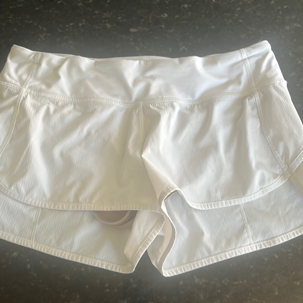 white lululemon shorts